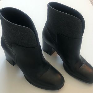 Nine West leather and felt boot. Like new condition. A few white marks on heel.